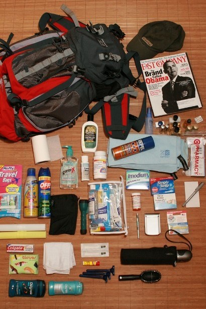 Tips for an african safari — packing for a trip. Equipment includes a first aid kit.