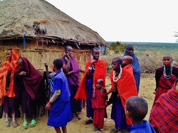 Family safaris in africa — maasai village, tanzania.