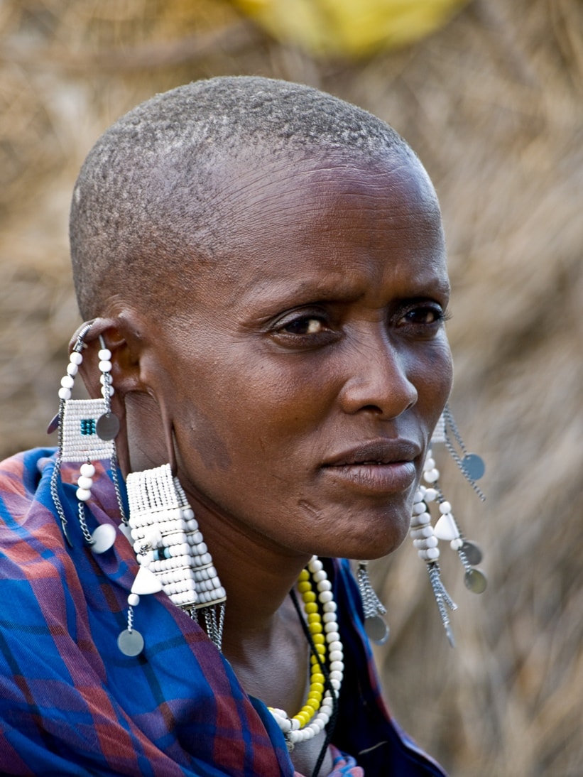 Maasai Woman in Traditional Clothing and Jewelry, Serengeti National Park, Tanzania.