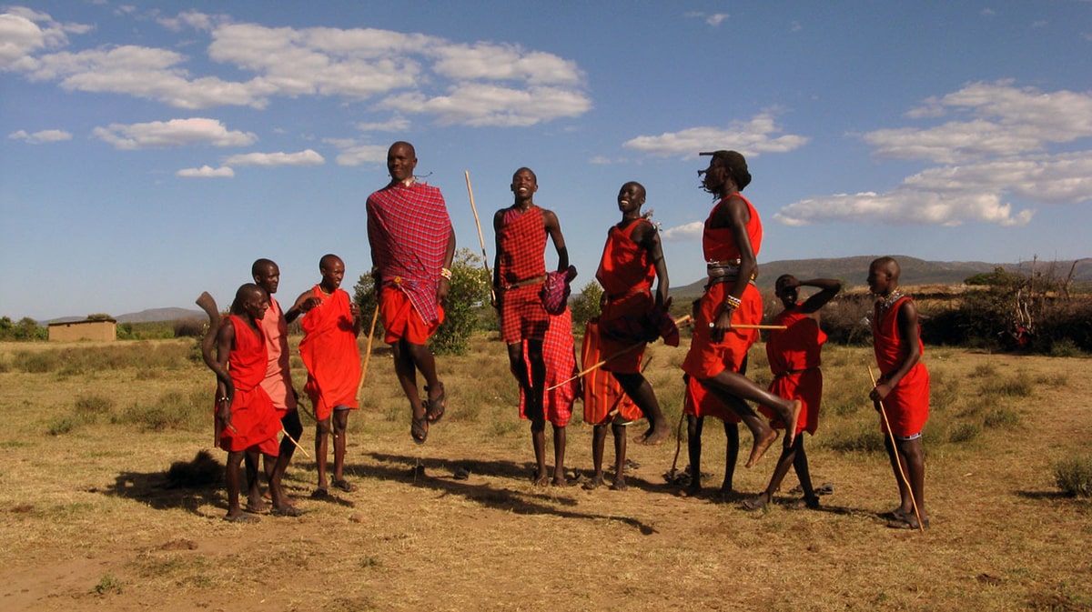 Maasai tribe of africa — maasai men performing traditional jumping dance, adumu.