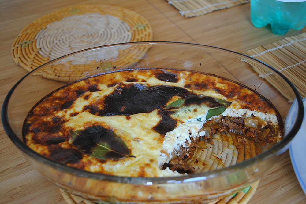 Bobotie — south-african dish made with minced meat, spices, egg, and milk.